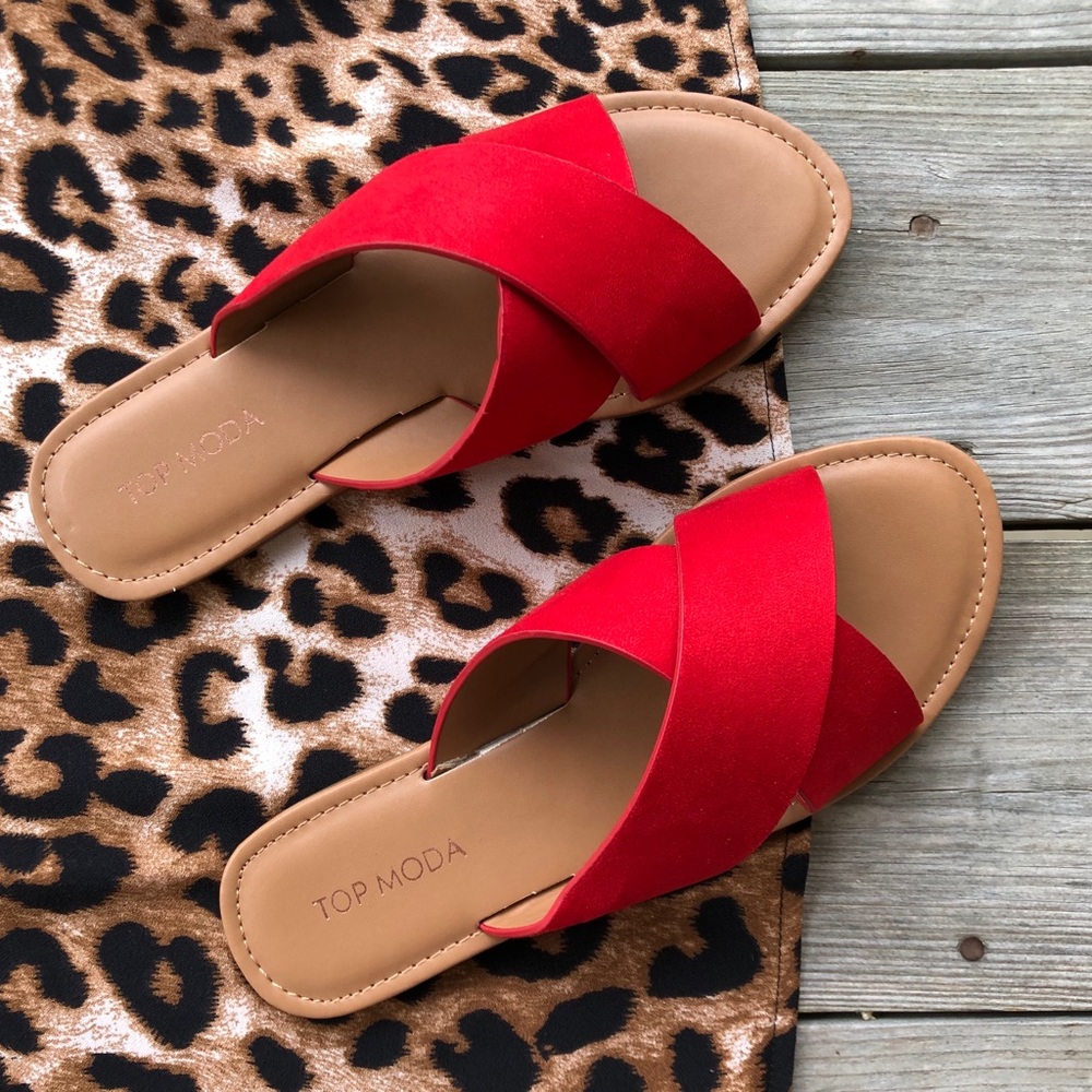 Red slip on flat sandals